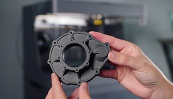 3D printer producing a part.