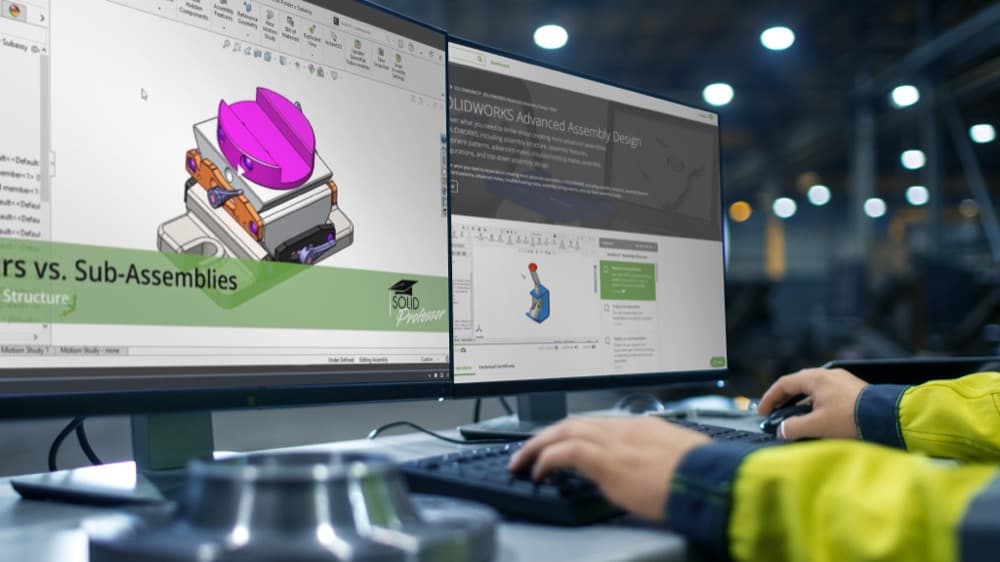 Engineer working across CAD software on dual monitors.