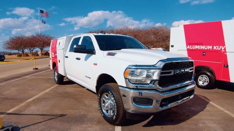 A work truck body being assembled on a manufacturing floor.