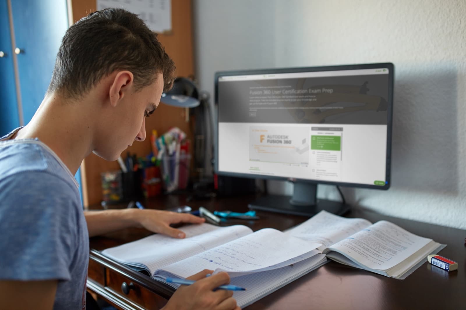 Student studying Fusion 360 certification prep in the SolidProfessor platform