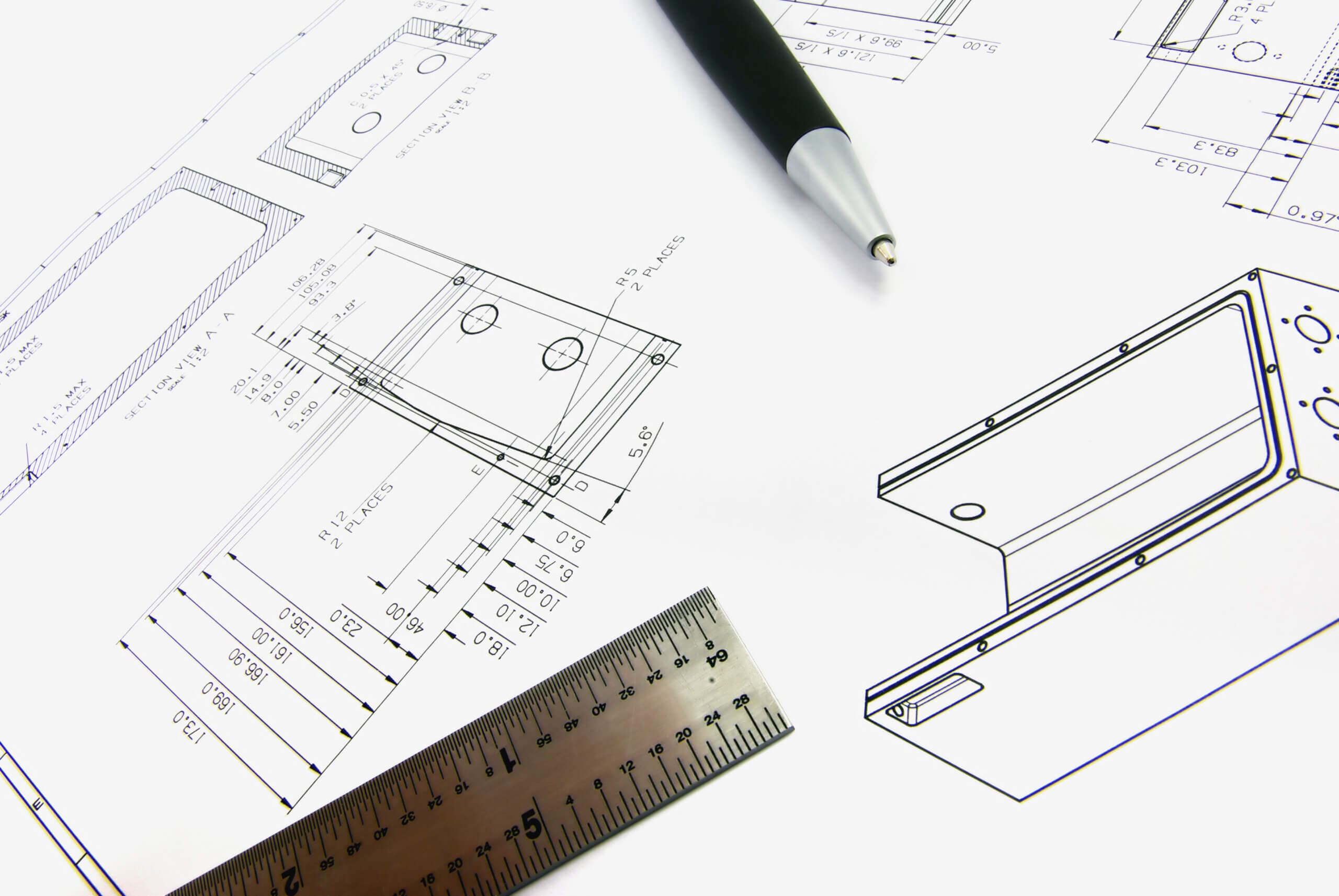 Technical engineering sketches, including a pen and a ruler.