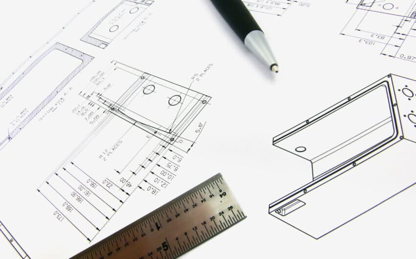 Technical engineering sketches, including a pen and a ruler.
